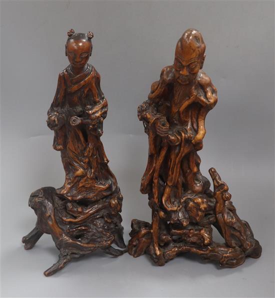A pair of Chinese rootwood figurative carvings tallest 36cm